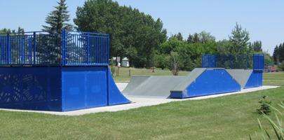 Skate ramp / area in middle of park.