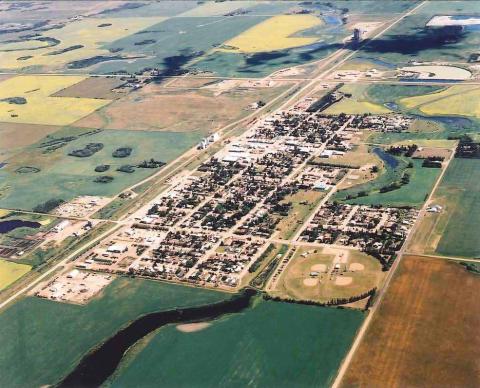 Township of Killam Aerial view. The Township is set up in a grid and is surrounded by land.