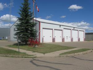 Exterior of Killam Fire Department Fire station. The fire station has 4 fire truck bays.